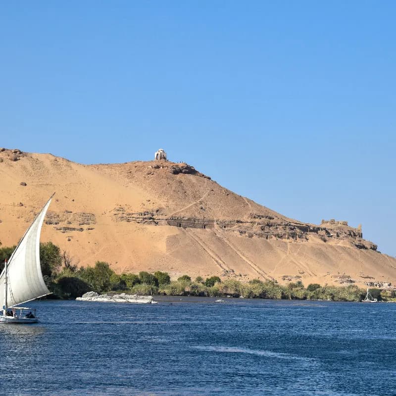 Beautiful Nile River scene in Aswan with feluccas