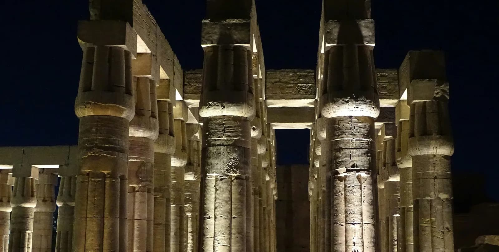 Karnak Temple complex and illuminated Luxor Temple at night