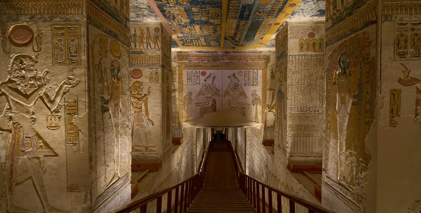 Egyptologist guide explaining temple carvings in Luxor